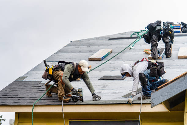 Professional Roofing technician working in Tracy, IA